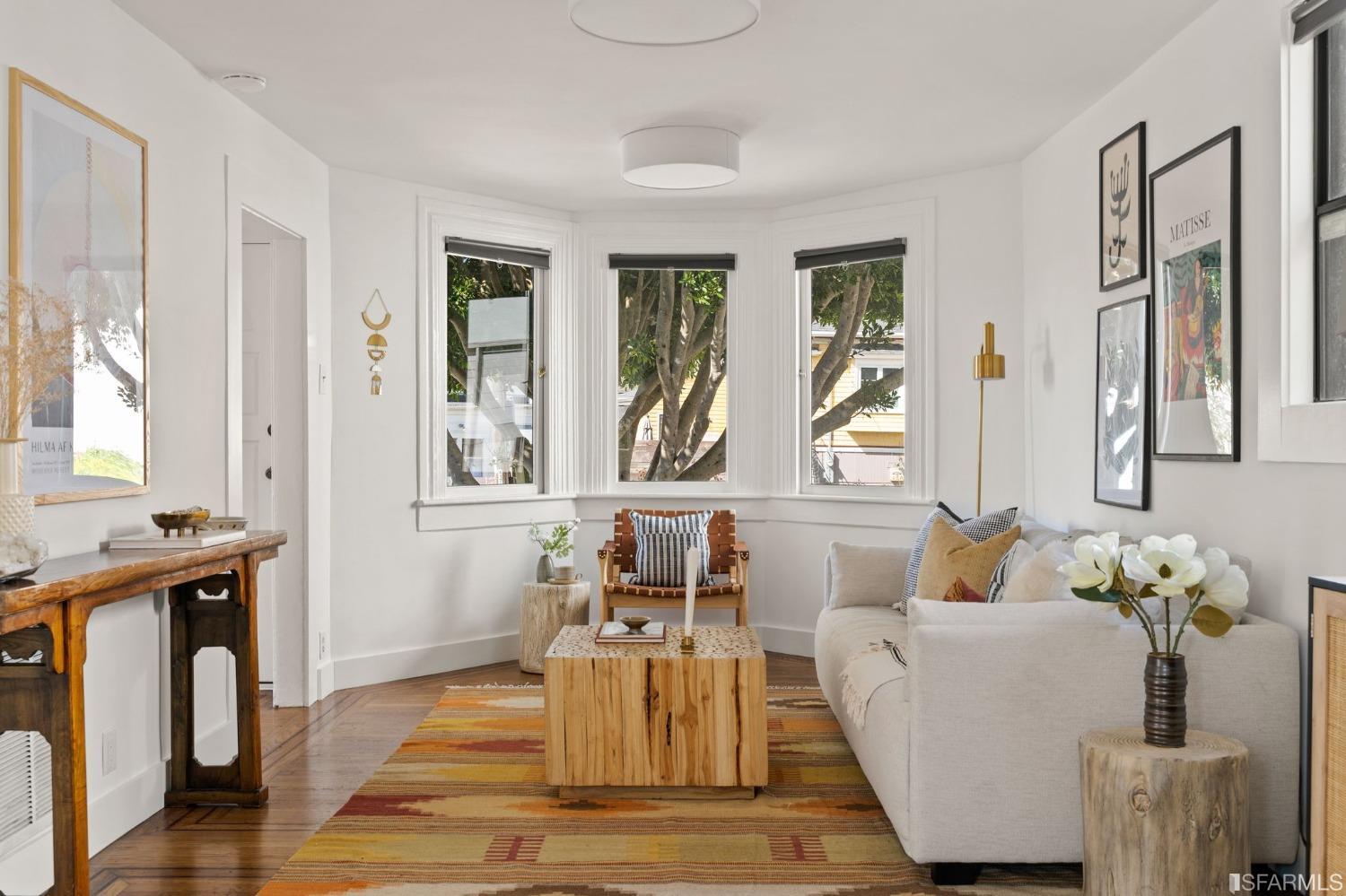 3045 Castro Street San Francisco, CA 94131 - Photo 2 of 44 a living room with furniture and wooden floor