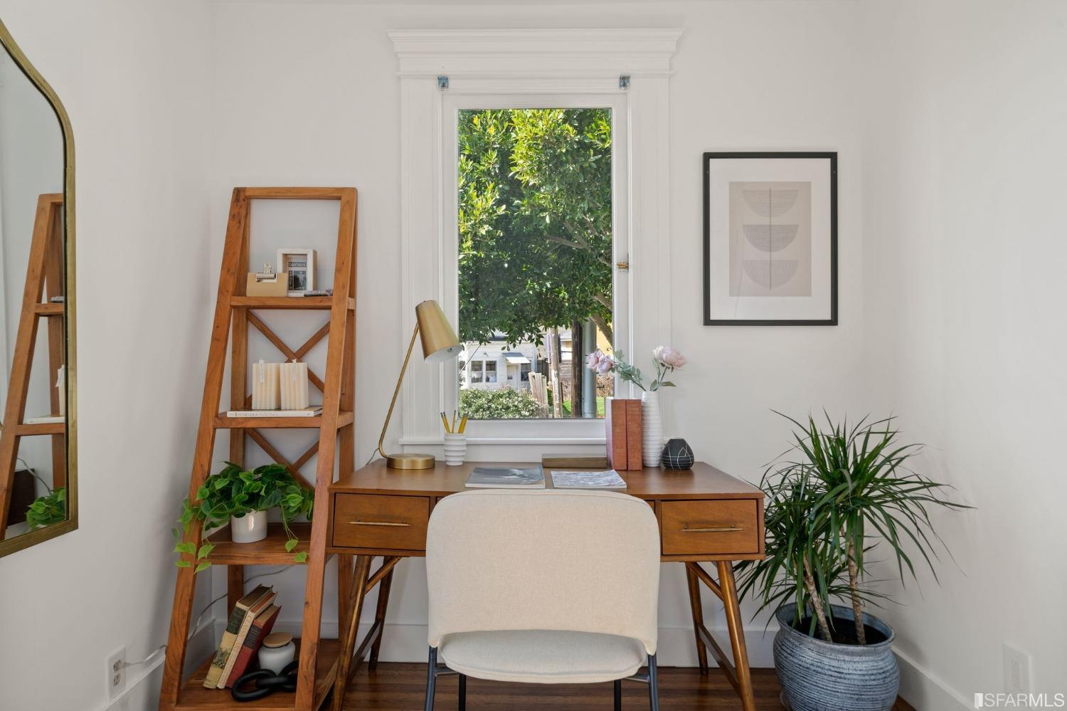 3045 Castro Street San Francisco, CA 94131 - Photo 21 of 44 a dining room with furniture and wooden floor