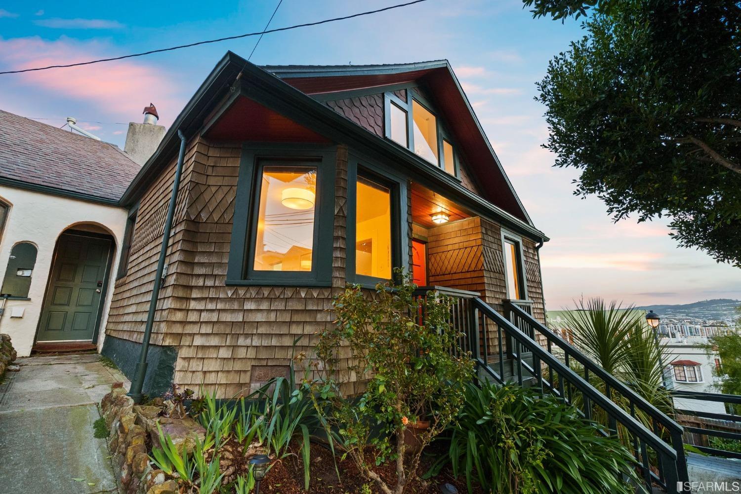 3045 Castro Street San Francisco, CA 94131 - Photo 33 of 44 a front view of a house with a yard