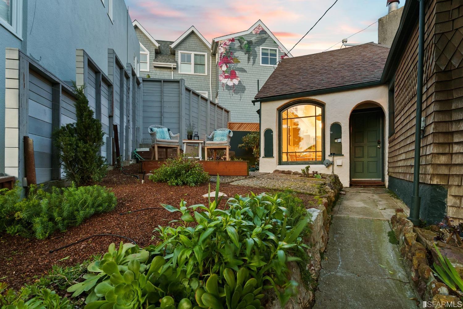 3045 Castro Street San Francisco, CA 94131 - Photo 34 of 44 a front view of a house with a garden