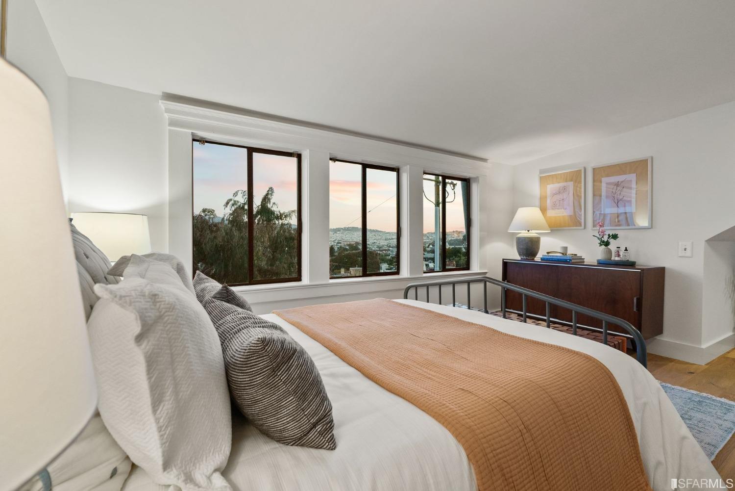 3045 Castro Street San Francisco, CA 94131 - Photo 37 of 44 a bedroom with a bed and a large window