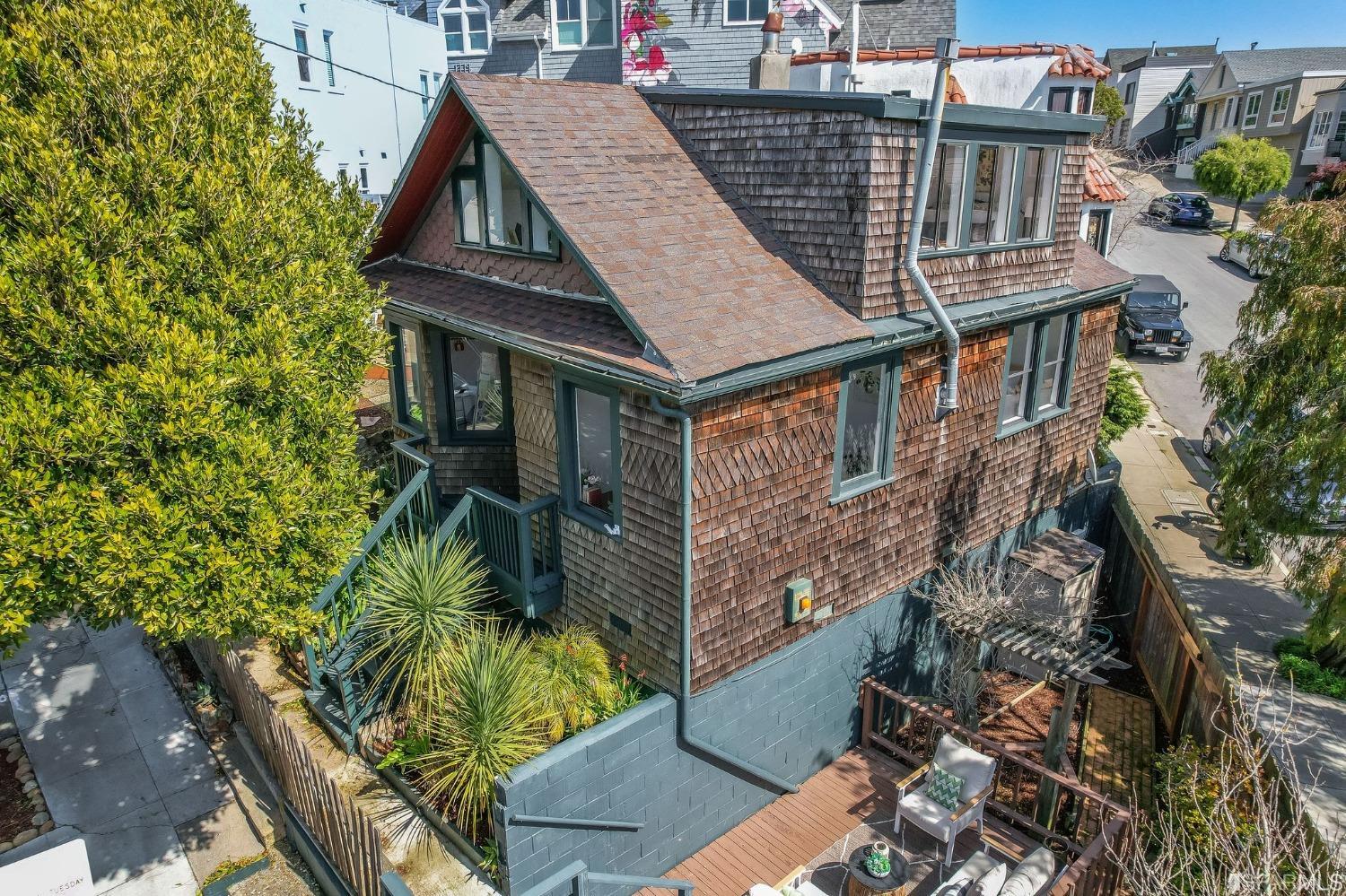 3045 Castro Street San Francisco, CA 94131 - Photo 40 of 44 front view of a house with a small yard