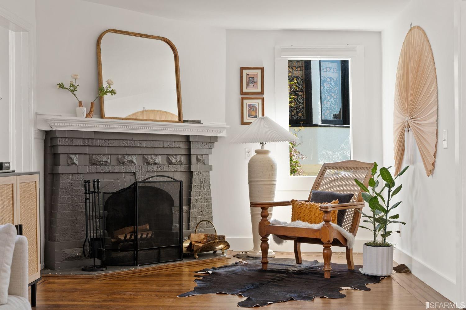 3045 Castro Street San Francisco, CA 94131 - Photo 4 of 44 a living room with furniture and a fireplace