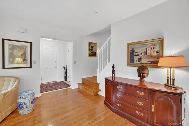 a bedroom with a bed and dresser