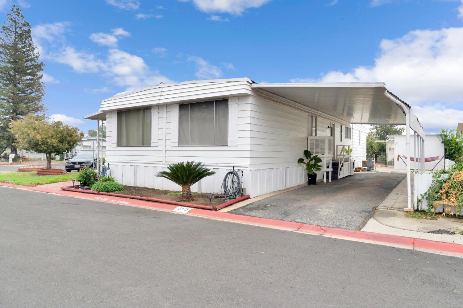 3556 North Duke Avenue, Unit 165 Fresno, CA 93727 - Photo 3 of 25 a house view with a outdoor space