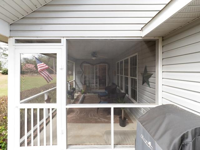 2400 Hoffman Road Jackson Springs, NC 27281 - Photo 16 of 19 Screened Porch/Back