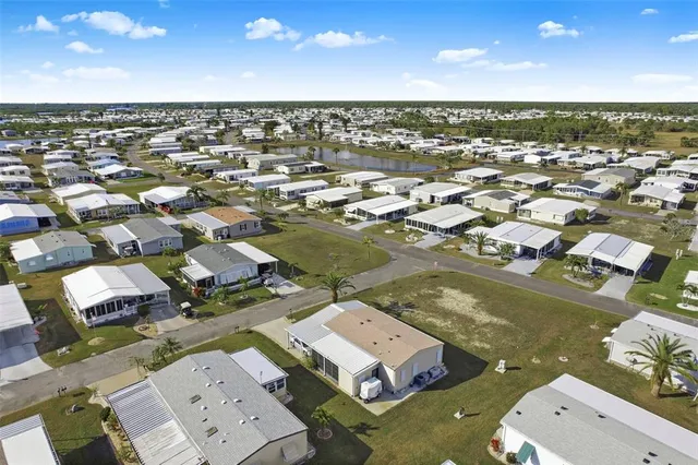 a view of a chairs and table in a patio