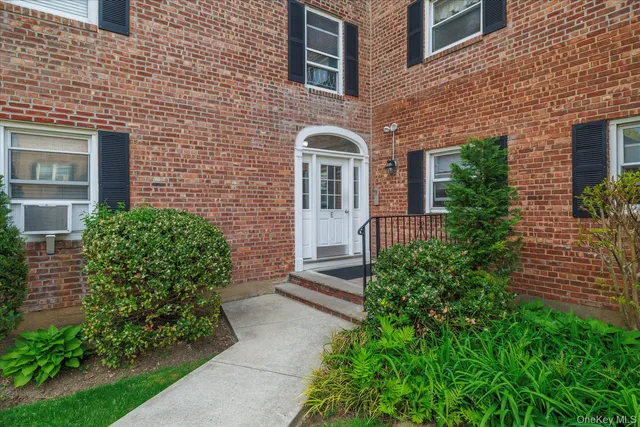 a front view of a house having yard