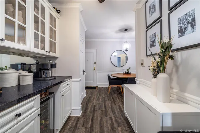 a kitchen with cabinets a sink and a stove