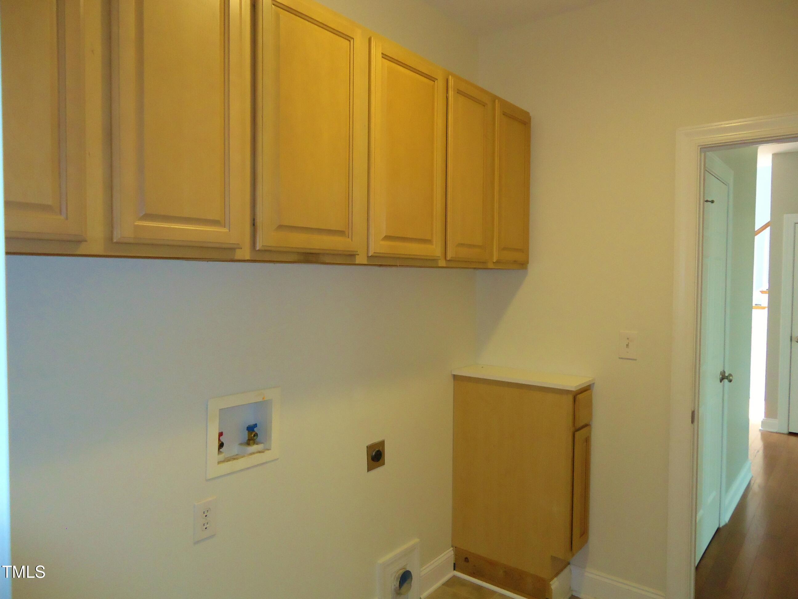 109 Bright Shade Court Holly Springs, NC 27540 - Photo 26 of 46 a bathroom with a sink