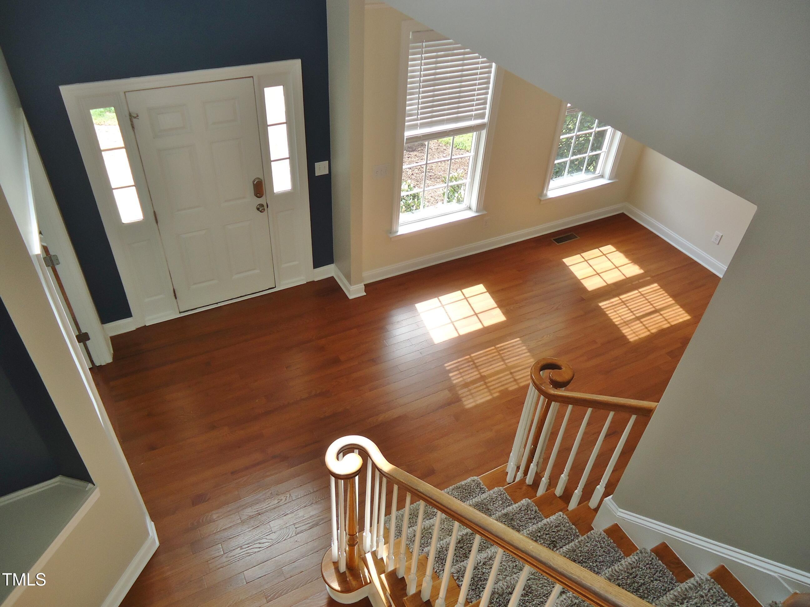 109 Bright Shade Court Holly Springs, NC 27540 - Photo 28 of 46 a view of an empty room with windows