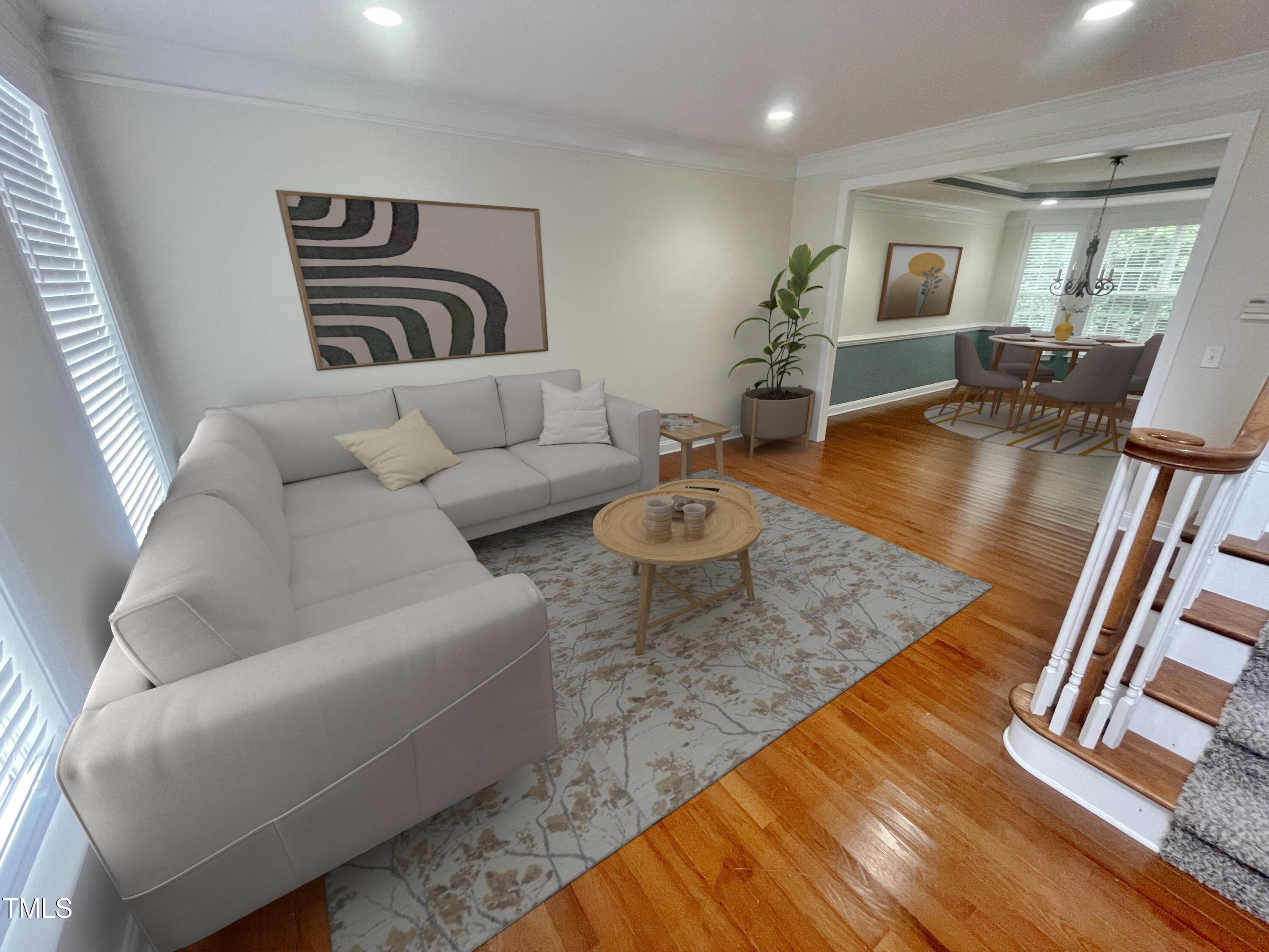 109 Bright Shade Court Holly Springs, NC 27540 - Photo 3 of 46 a living room with furniture and a wooden floor