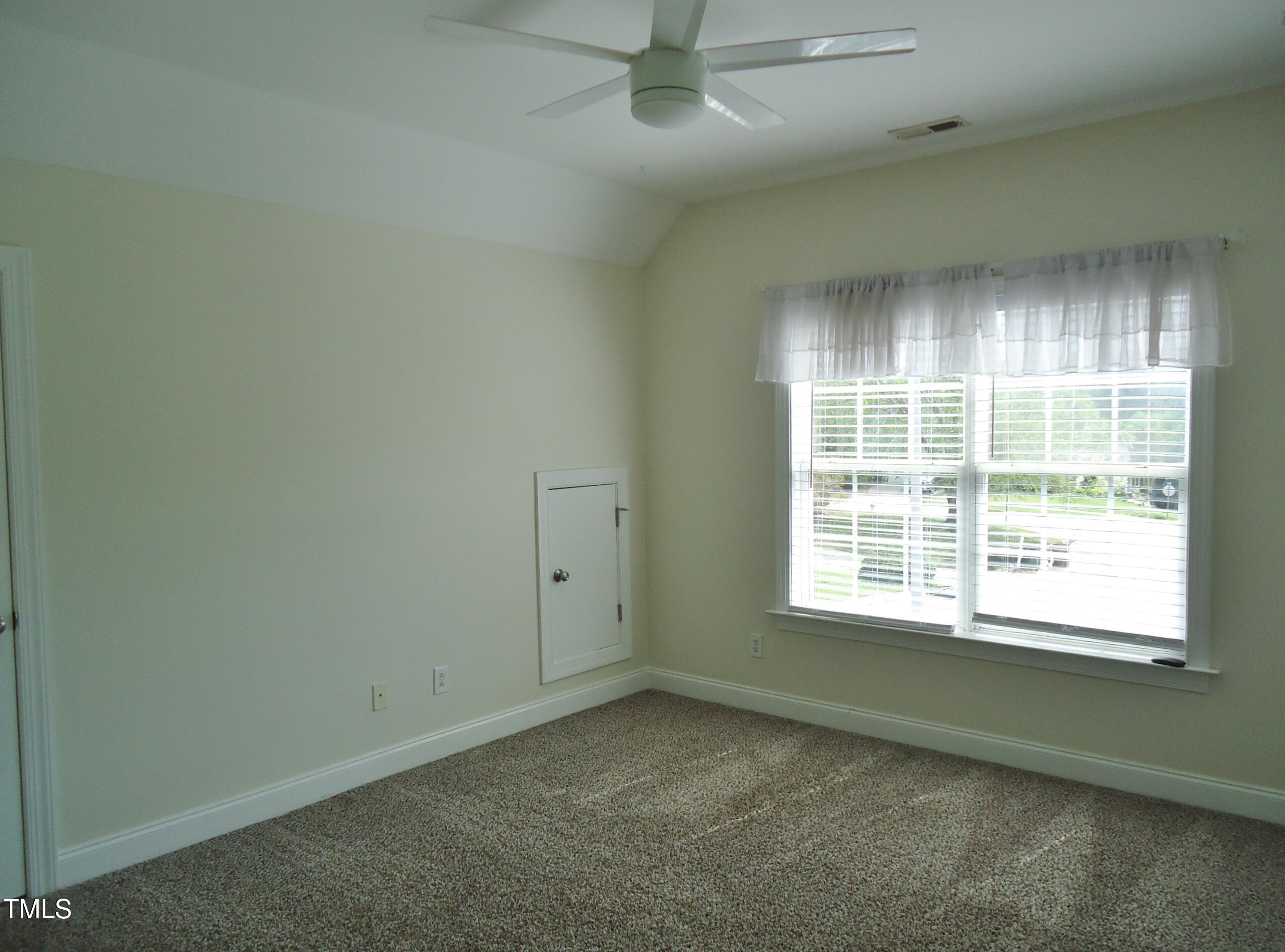 109 Bright Shade Court Holly Springs, NC 27540 - Photo 38 of 46 an empty room with a window