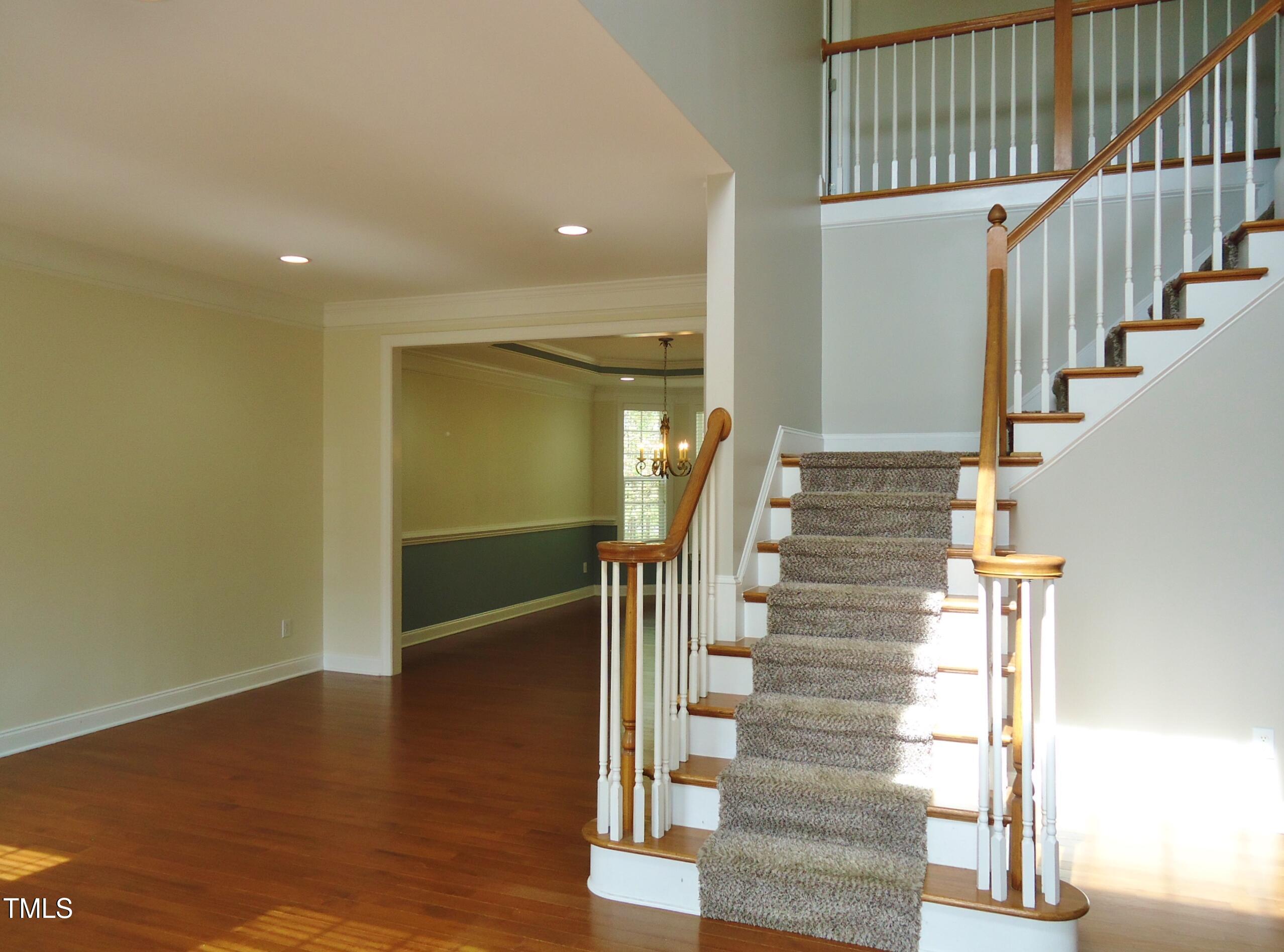 109 Bright Shade Court Holly Springs, NC 27540 - Photo 5 of 46 a view of entryway and hall with wooden floor