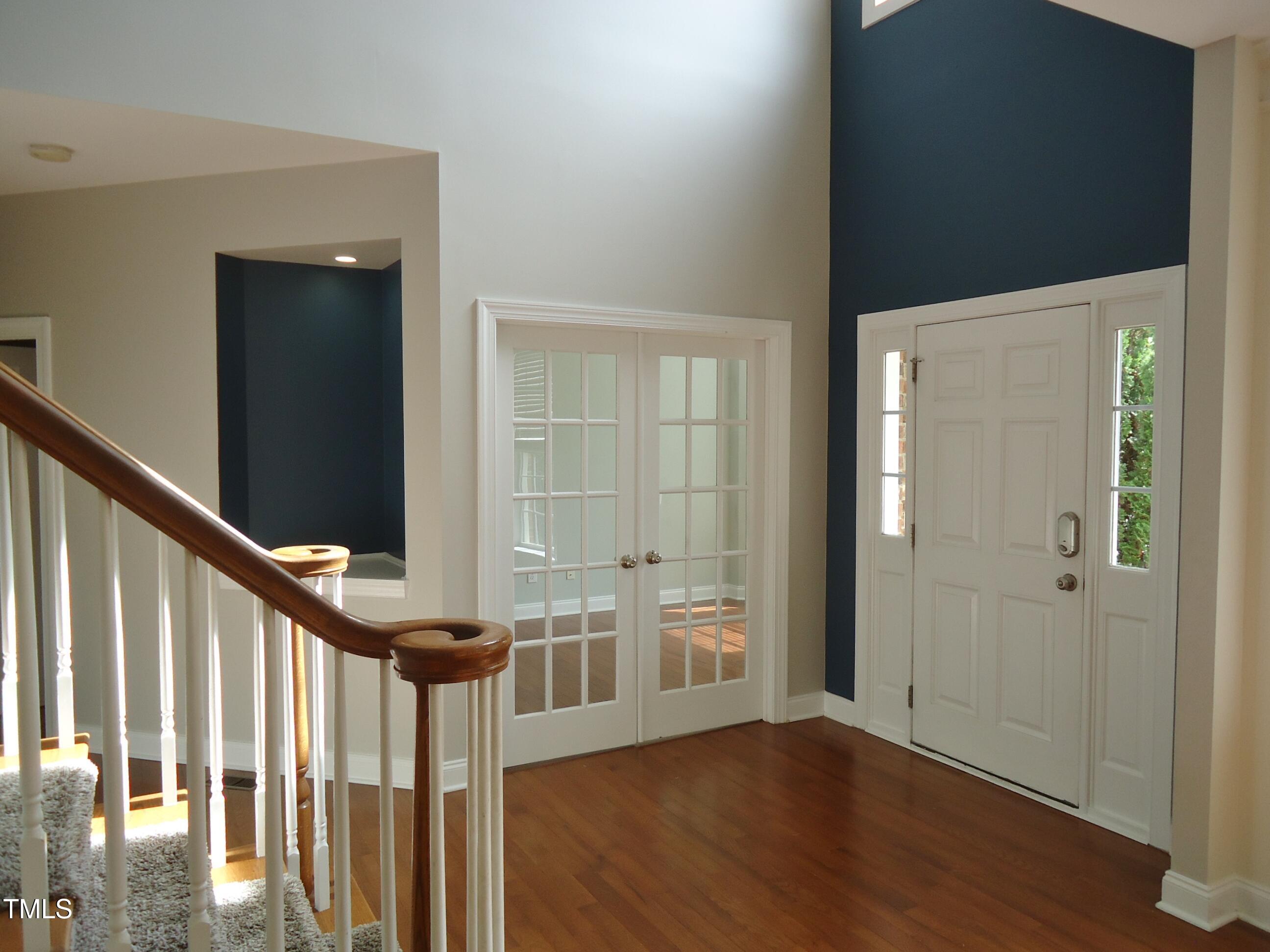 109 Bright Shade Court Holly Springs, NC 27540 - Photo 6 of 46 a view of an entryway with wooden floor