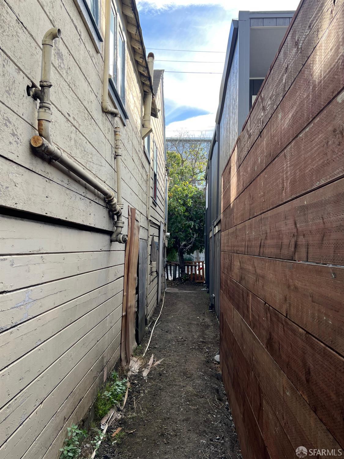 3064 Ford Street Oakland, CA 94601 - Photo 12 of 14 a view of a pathway of a house