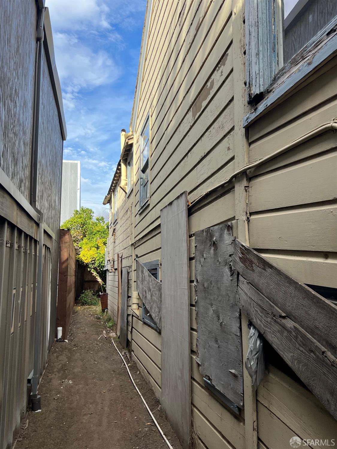 3064 Ford Street Oakland, CA 94601 - Photo 13 of 14 a view of a house with a window
