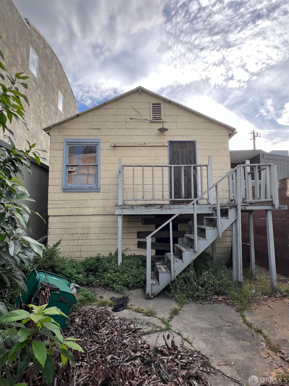 3064 Ford Street Oakland, CA 94601 - Photo 2 of 14 a view of a house with wooden deck