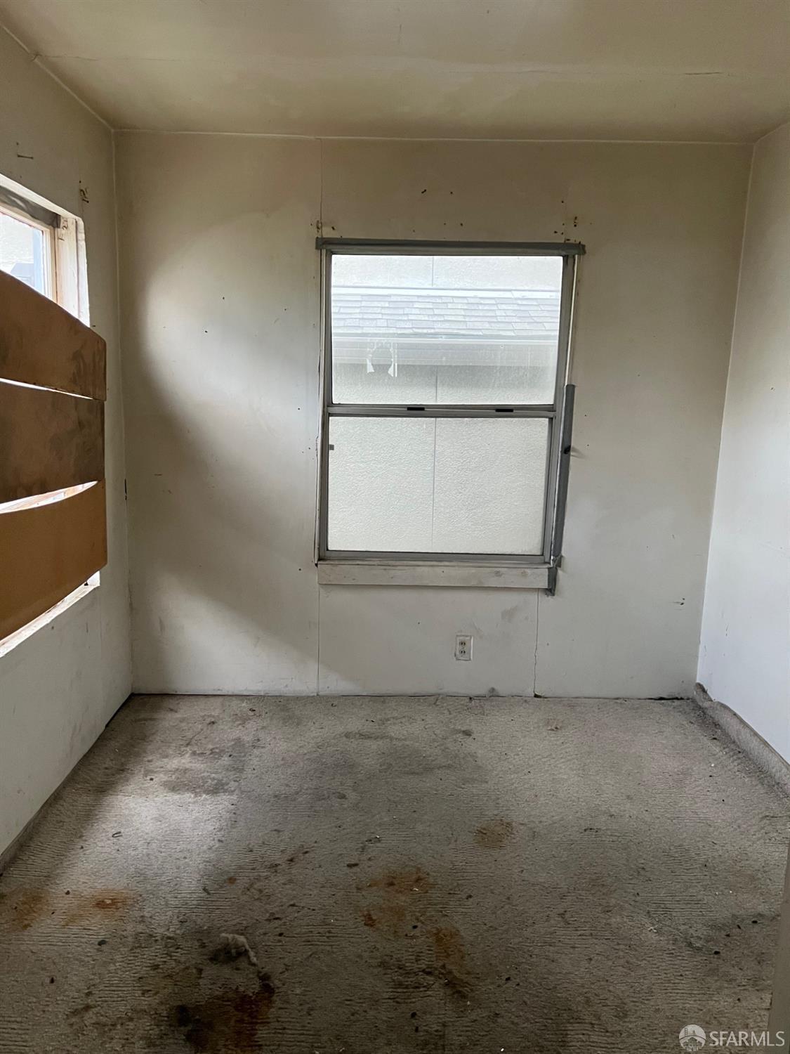 3064 Ford Street Oakland, CA 94601 - Photo 9 of 14 an empty room with windows