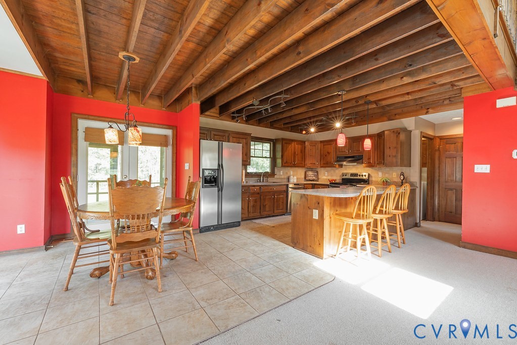 5146 Studley Road Mechanicsville, VA 23116 - Photo 18 of 50 a patio with a table and chairs