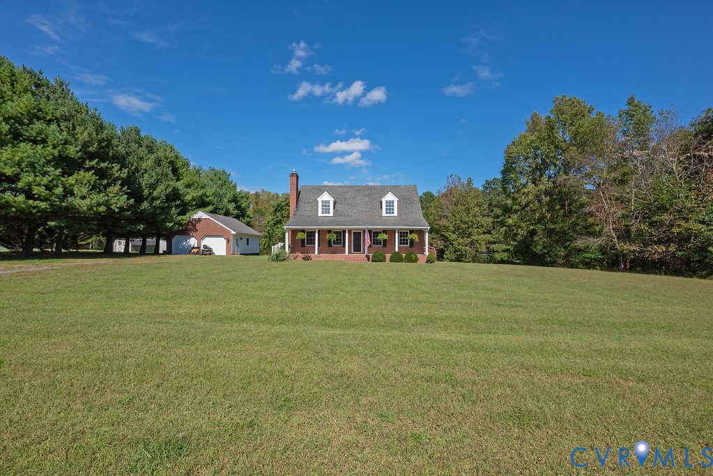 5146 Studley Road Mechanicsville, VA 23116 - Photo 2 of 50 a front view of a house with garden