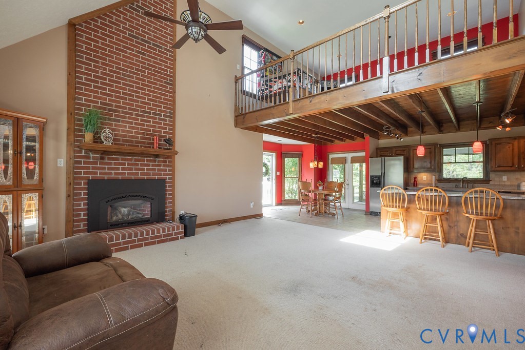 5146 Studley Road Mechanicsville, VA 23116 - Photo 22 of 50 a view of a livingroom with furniture and a fireplace