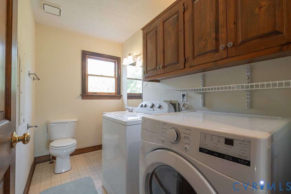 5146 Studley Road Mechanicsville, VA 23116 - Photo 24 of 50 a utility room with dryer and washer