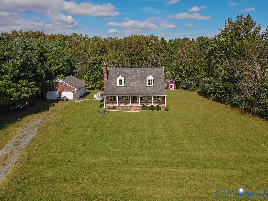 5146 Studley Road Mechanicsville, VA 23116 - Photo 42 of 50 a view of a lake with a mountain in the background