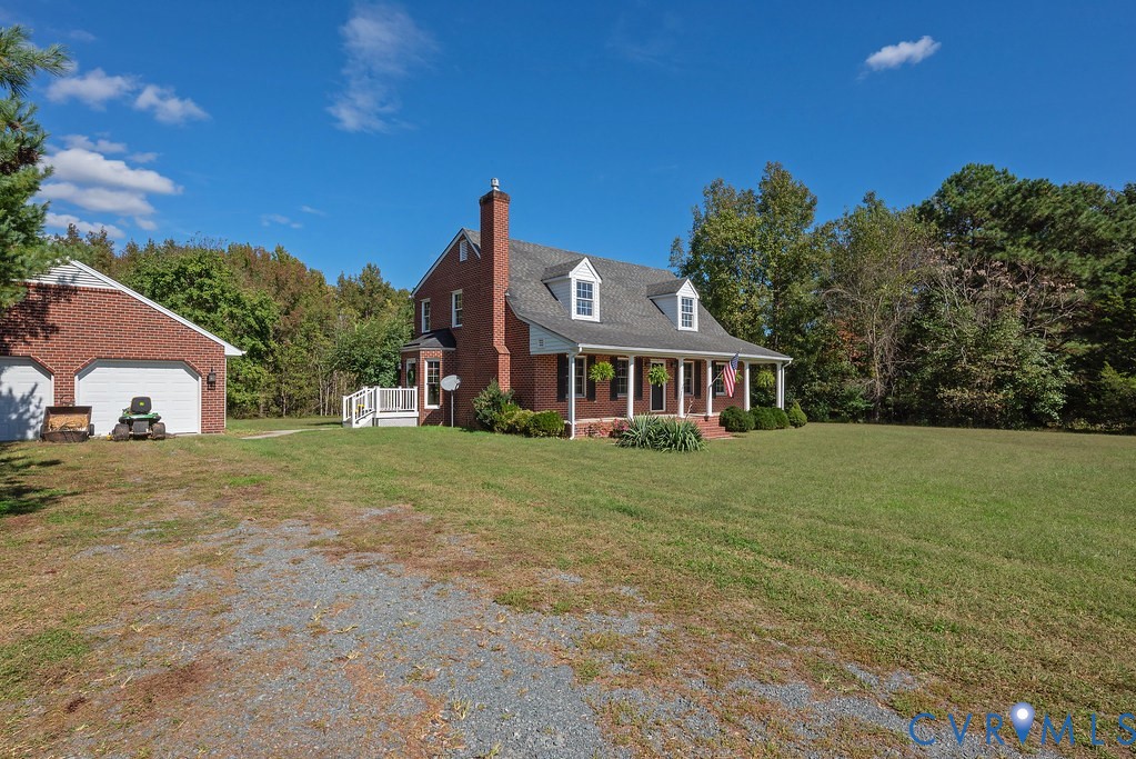 5146 Studley Road Mechanicsville, VA 23116 - Photo 5 of 50 a front view of a house with a yard