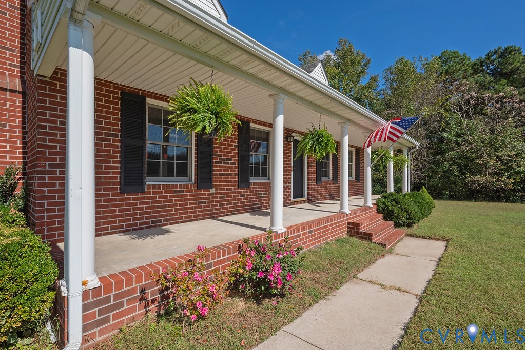 5146 Studley Road Mechanicsville, VA 23116 - Photo 6 of 50 front view of a house with a yard