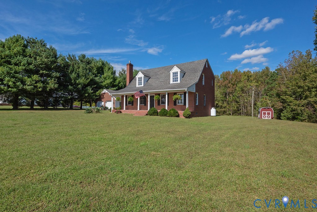 5146 Studley Road Mechanicsville, VA 23116 - Photo 8 of 50 a front view of a house with a yard