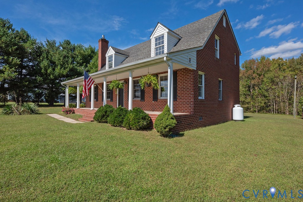 5146 Studley Road Mechanicsville, VA 23116 - Photo 10 of 50 front view of a house with a yard