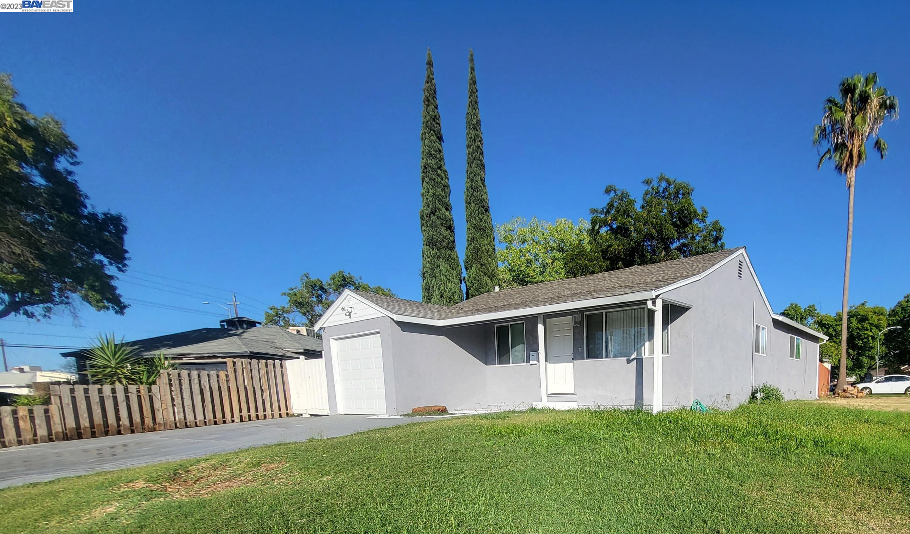 5540 Georgia Drive North Highlands, CA 95660 - Photo 1 of 11 a front view of a house with garden