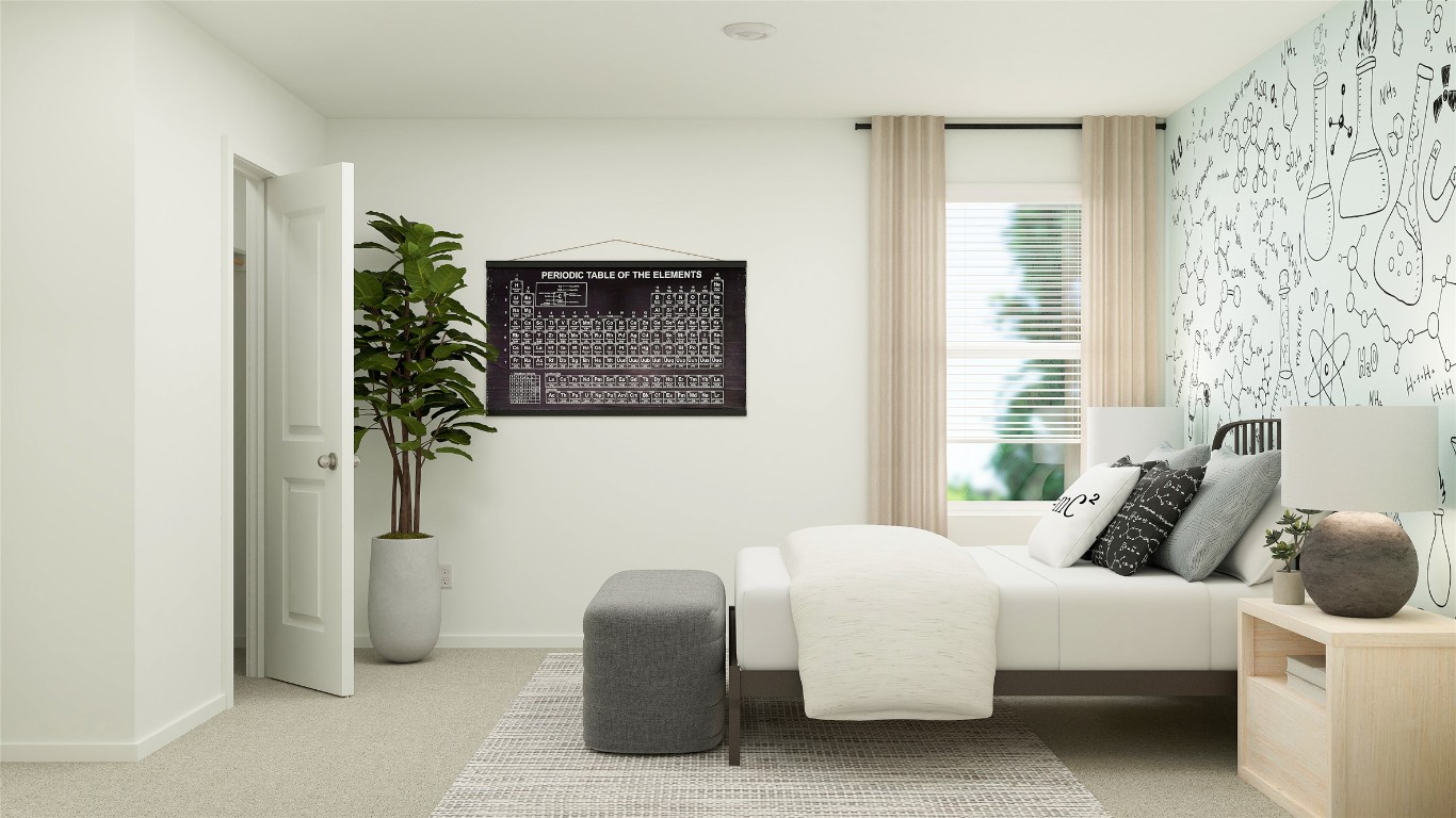 427 Silvercloud Drive Lockhart, TX 78644 - Photo 14 of 37 a bedroom with a bed and a potted plant