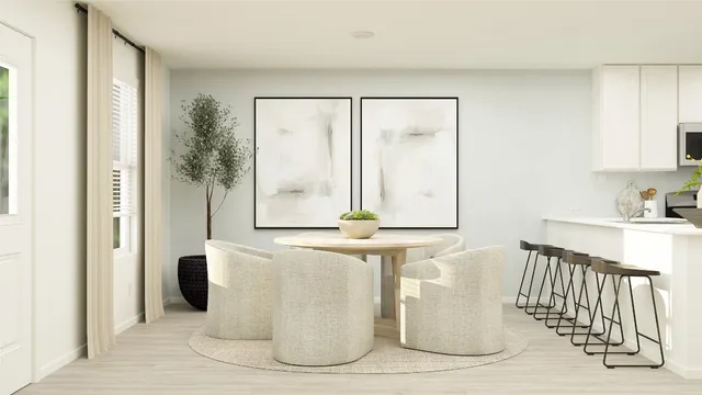 a white vase sitting on top of a shelf