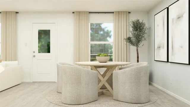 a view of living room filled with furniture and window