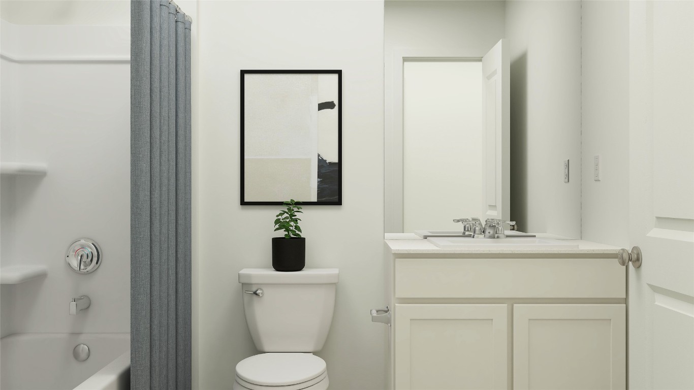 427 Silvercloud Drive Lockhart, TX 78644 - Photo 32 of 37 a bathroom with a toilet sink and mirror