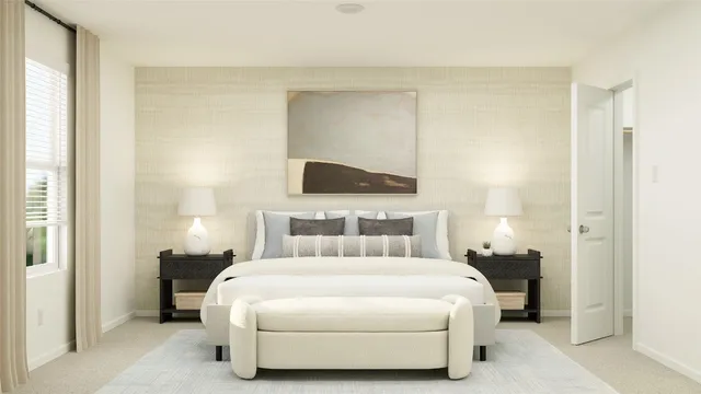 a bedroom with a bed and a night stand