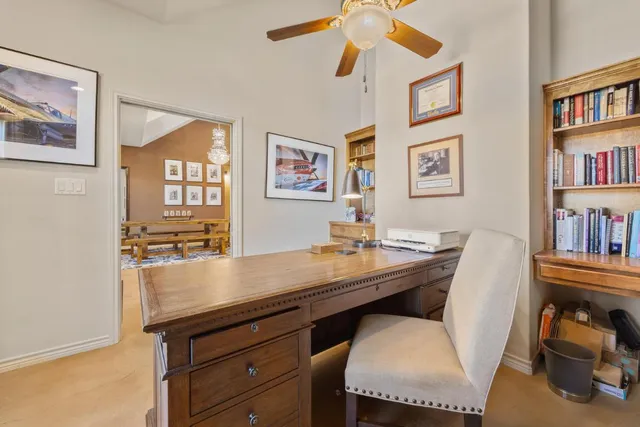 a view of a workspace with furniture