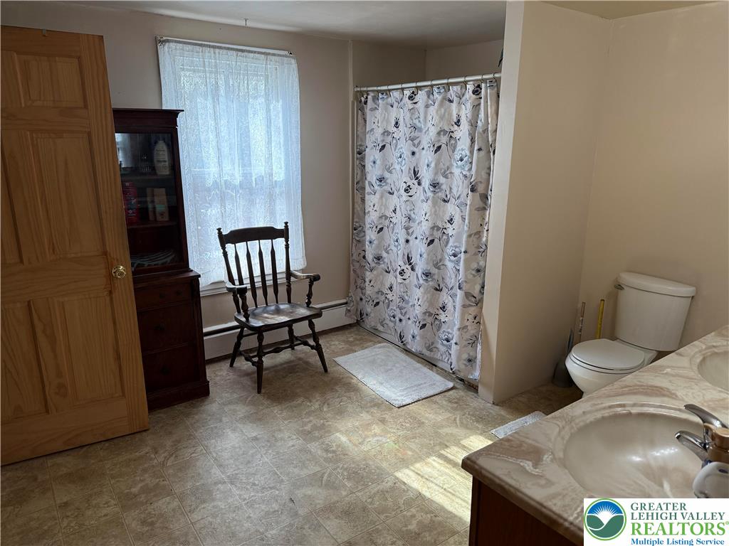 1227 Valley Road Tamaqua, PA 18252 - Photo 16 of 47 a bathroom with a toilet and a shower
