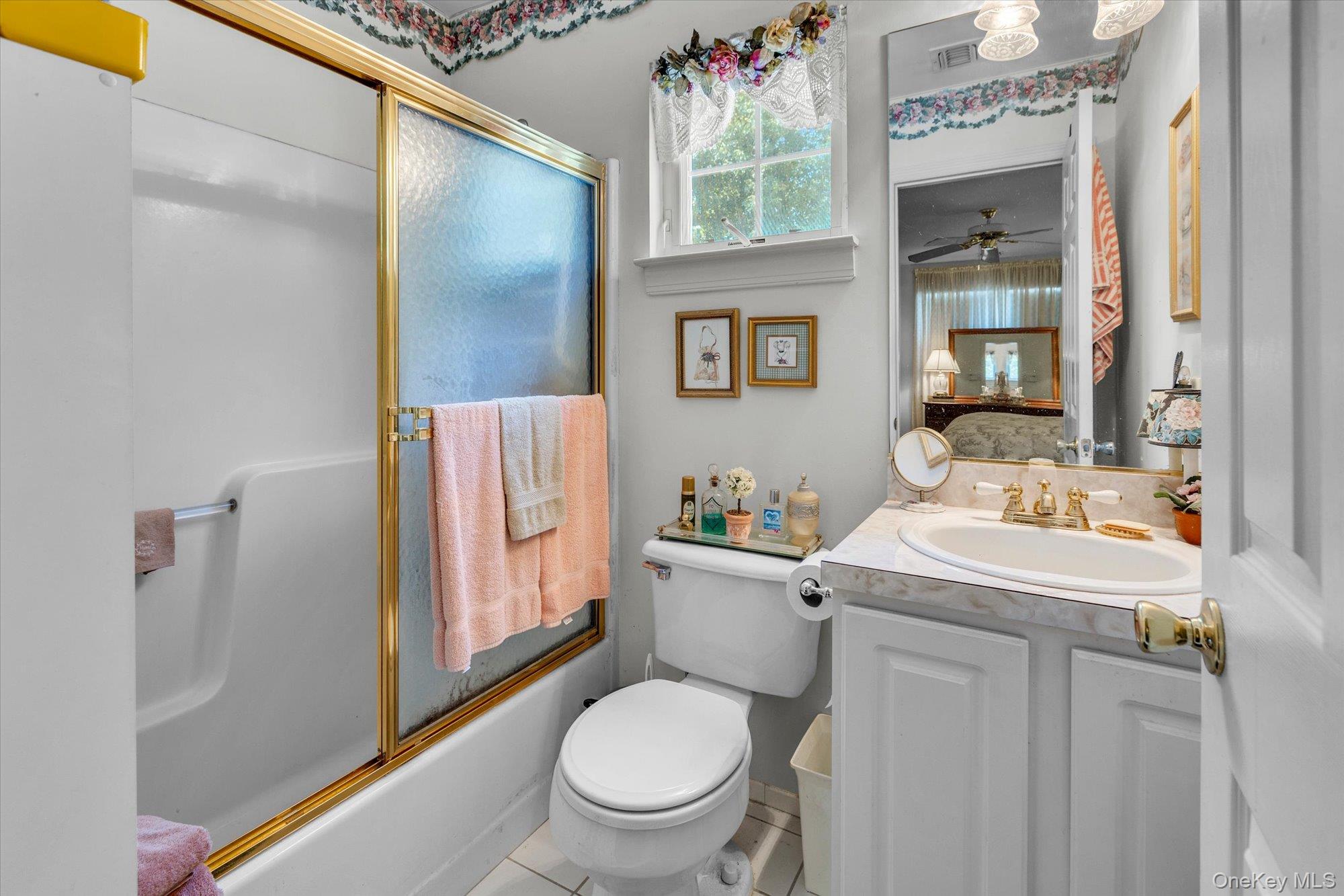 702 Pebble Beach Path Riverhead, NY 11901 - Photo 14 of 17 Second Floor Bathroom attached to bedroom.