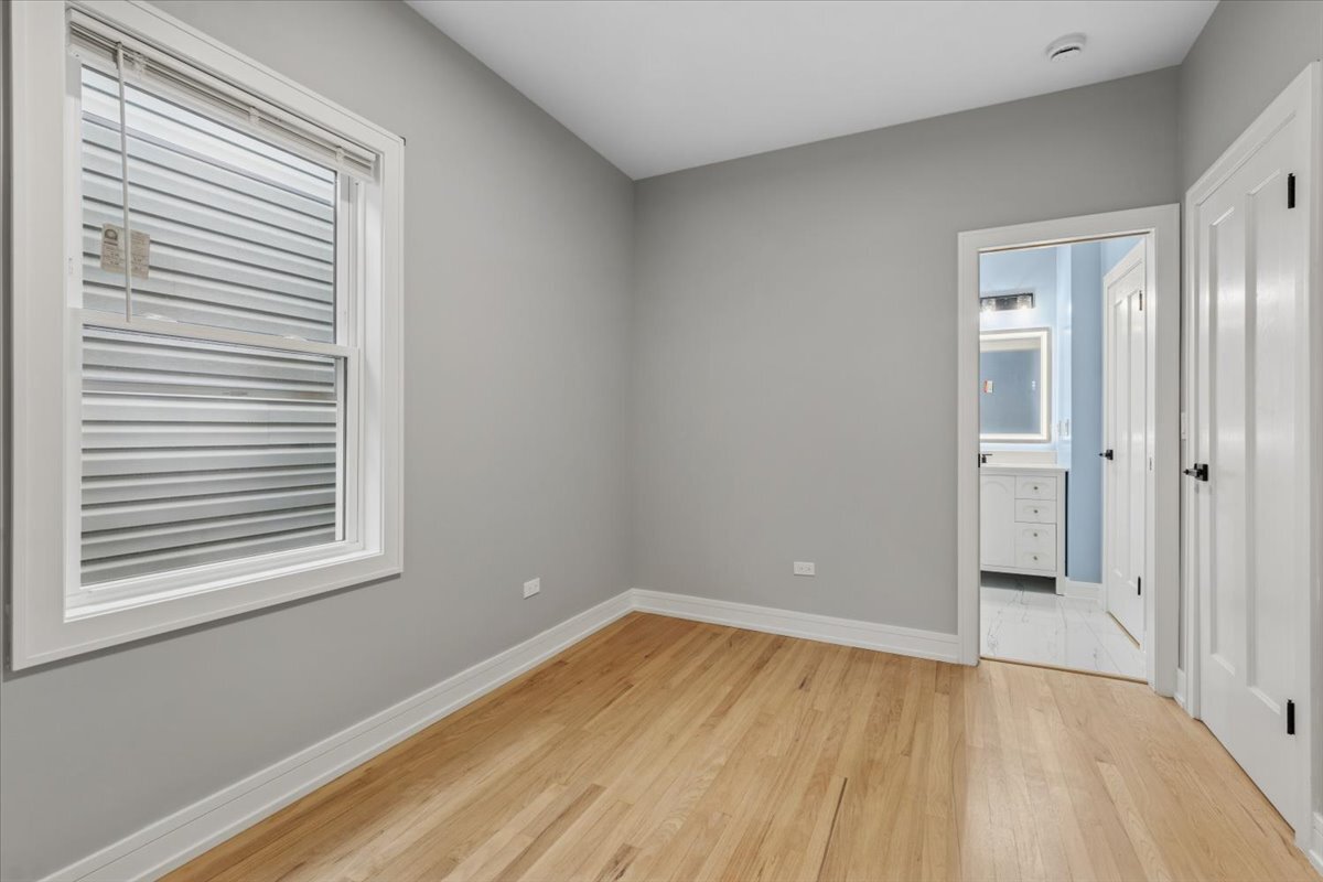 2159 North Parkside Avenue Chicago, IL 60639 - Photo 13 of 23 a view of a room that has a window in it