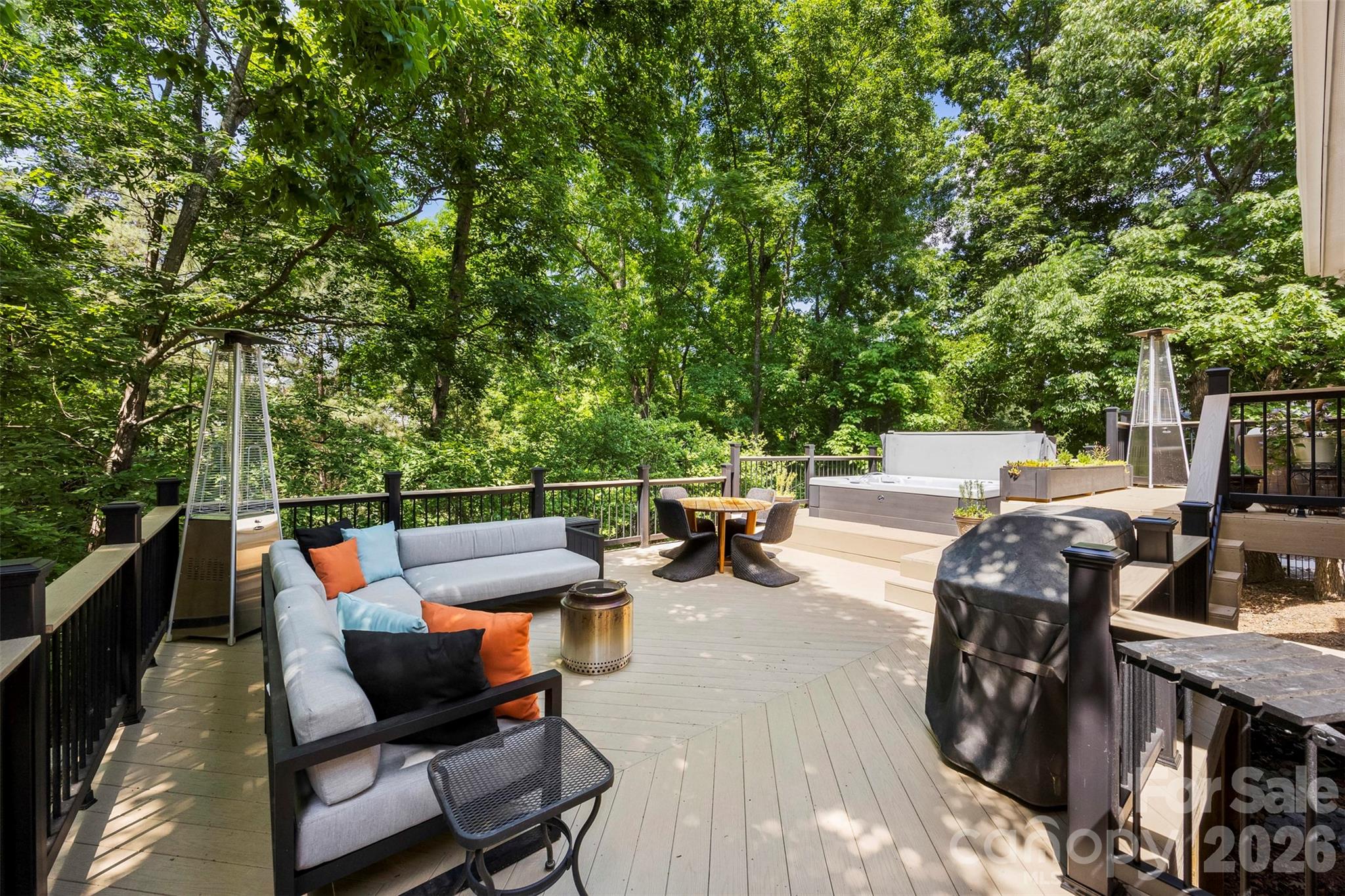 606 Andover Lane Tega Cay, SC 29708 - Photo 33 of 48 a patio with patio a couch and chairs