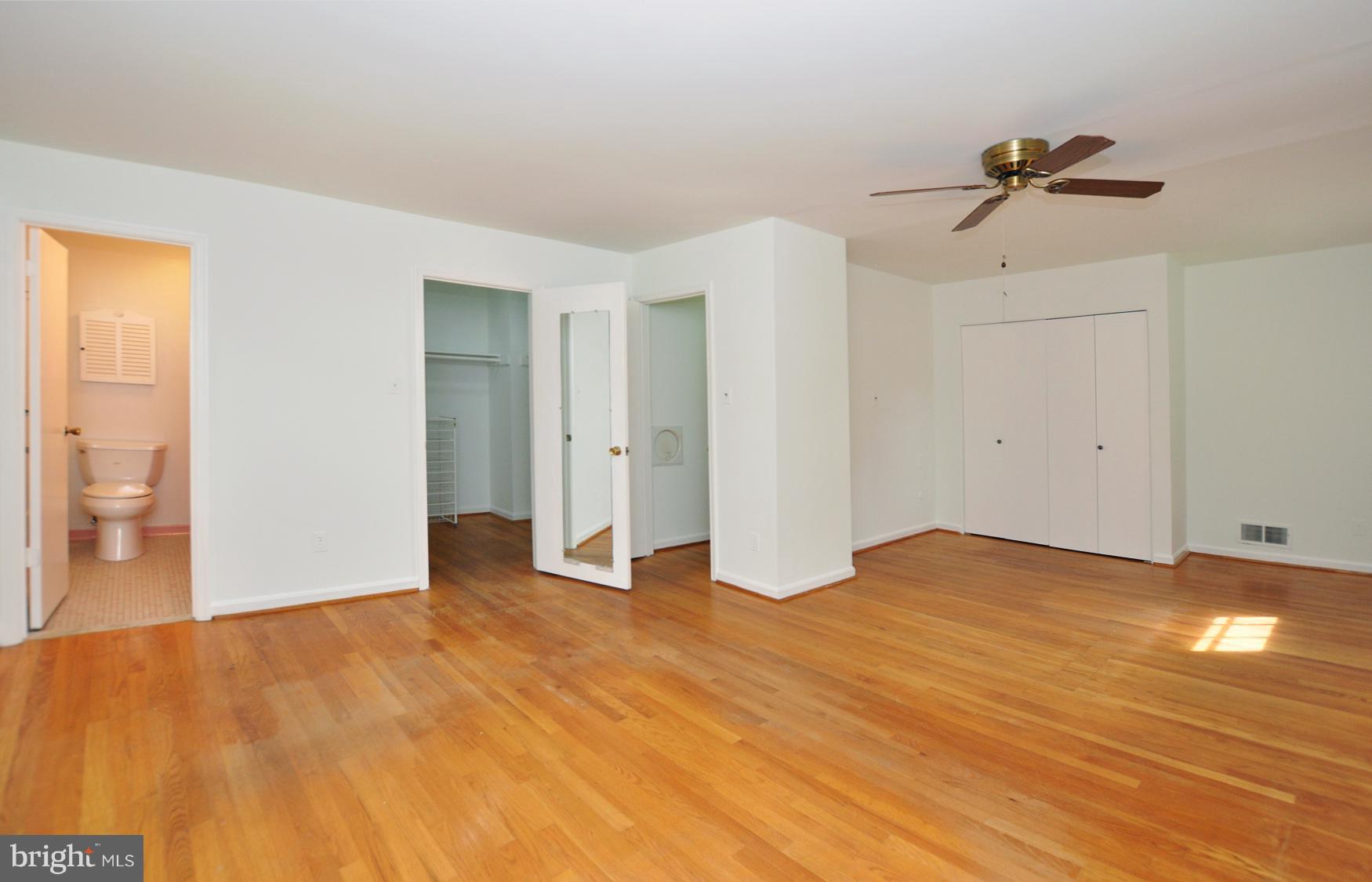 12906 Stonecrest Drive Silver Spring, MD 20904 - Photo 13 of 17 a view of empty room with wooden floor