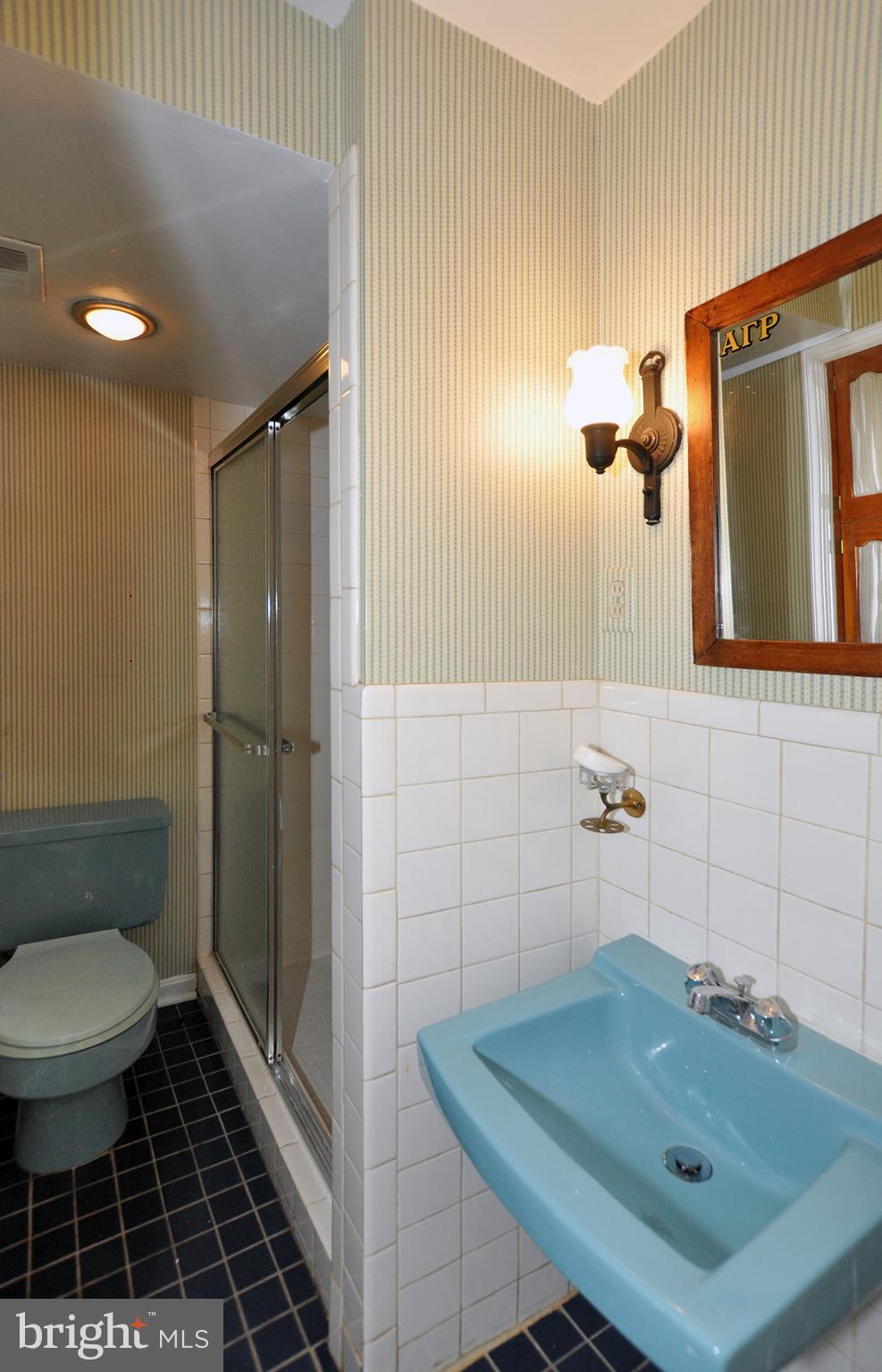 12906 Stonecrest Drive Silver Spring, MD 20904 - Photo 17 of 17 a bathroom with a sink toilet and shower