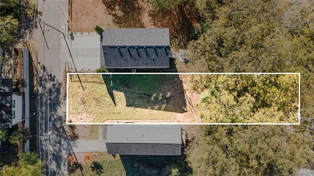 a view of a balcony with a tree