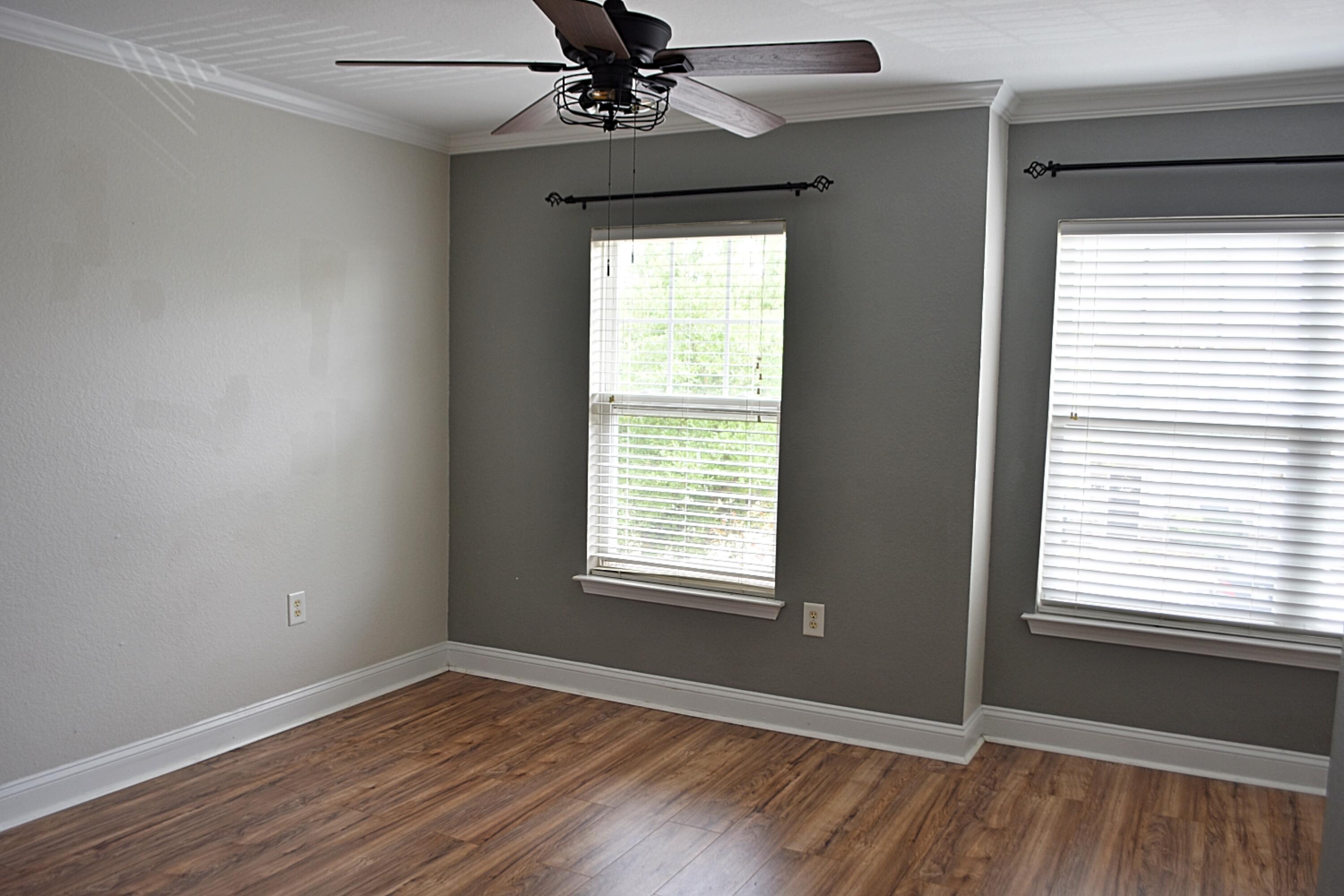 18 South Sand Palm Road, Unit 51 Freeport, FL 32439 - Photo 11 of 16 a view of an empty room with wooden floor and a window