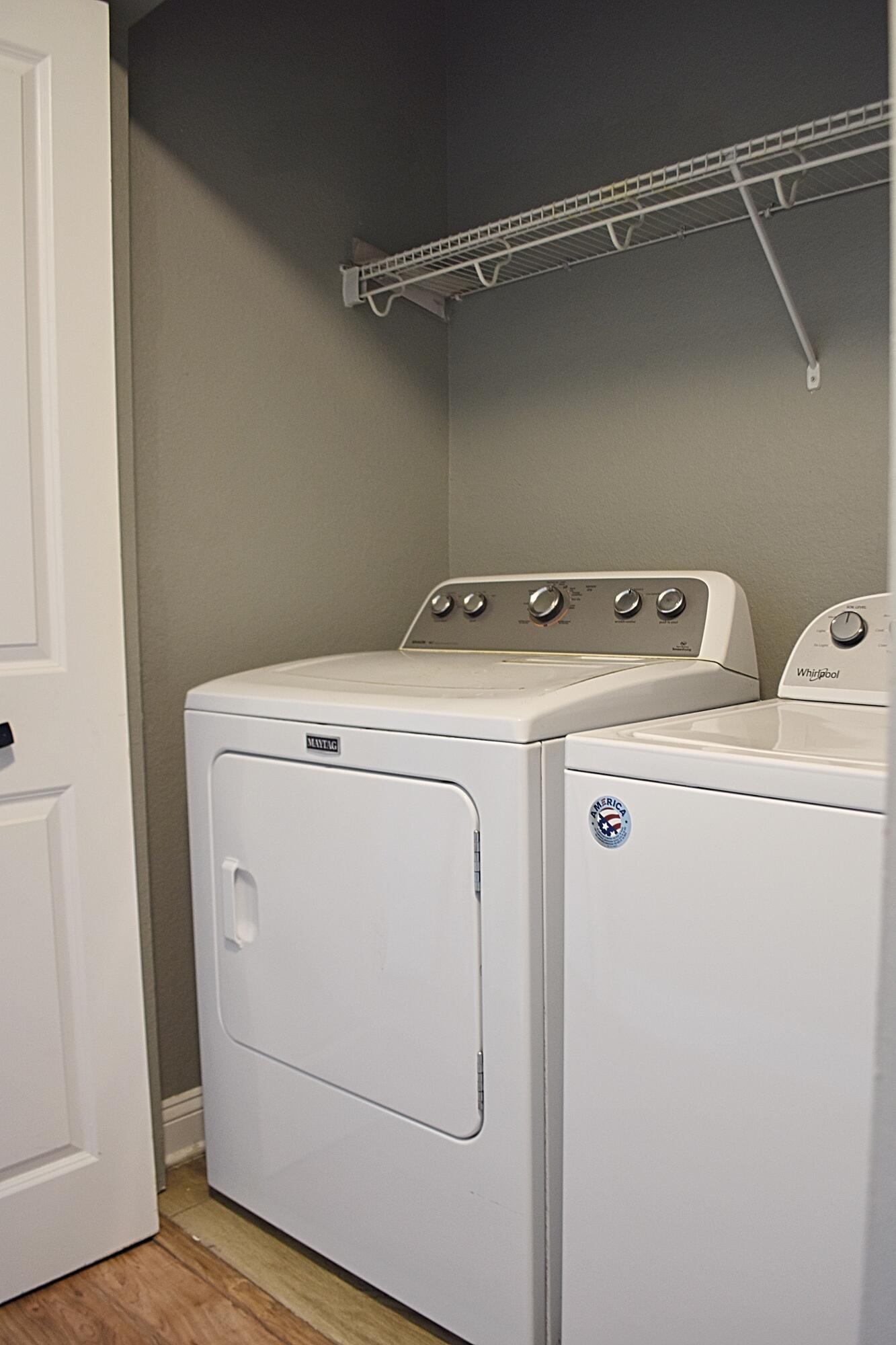 18 South Sand Palm Road, Unit 51 Freeport, FL 32439 - Photo 13 of 16 a utility room with dryer and washer