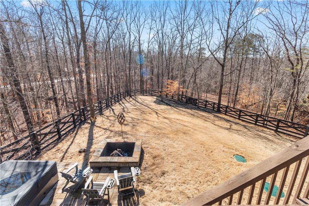 308 Hugh Stowers Road Dawsonville, GA 30534 - Photo 56 of 81 a view of a backyard with wooden fence