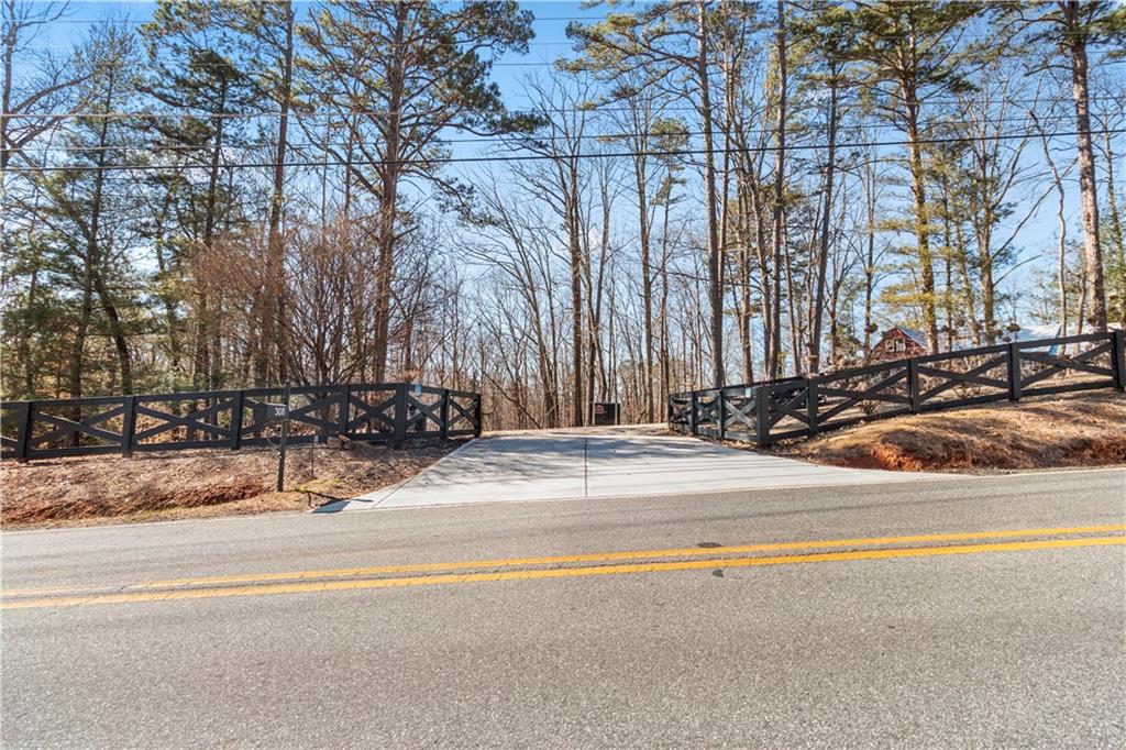 308 Hugh Stowers Road Dawsonville, GA 30534 - Photo 74 of 81 a view of car parked on the side of street